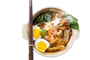 Bowl of egg soup served with a stick and assorted side dishe